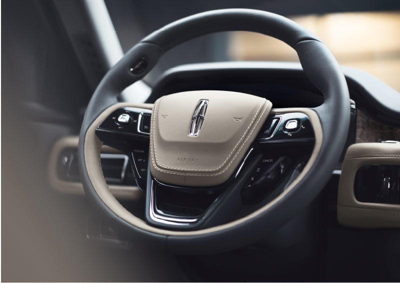 The intuitively placed controls of the steering wheel on a 2023 Lincoln Aviator® SUV | Pierre Lincoln in Lynnwood WA