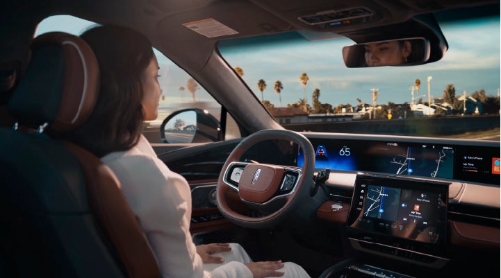 A person is shown driving hands-free on the highway with available Lincoln BlueCruise technology. | Pierre Lincoln in Lynnwood WA