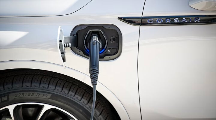 An electric charger is shown plugged into the charging port of a Lincoln Corsair® Grand Touring
model. | Pierre Lincoln in Lynnwood WA